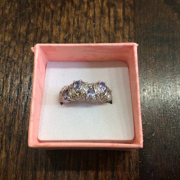 925 Sterling Silver Jewelry - 925 sterling silver ring with amethyst stones. Size 7